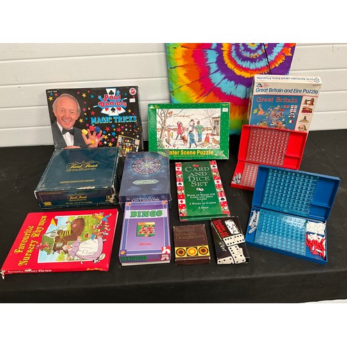 397 - BOX OF GAMES AND BODY BOARD