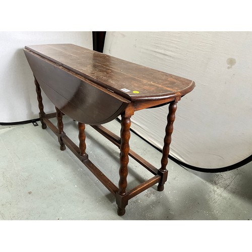 400 - VINTAGE OAK GATE LEG DROP LEAF OVAL DINING TABLE WITH BOBBIN LEG H30” W60” D41”