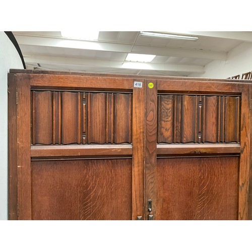 418 - VINTAGE OAK PRIORY DOUBLE WARDROBE WITH 2 DOORS WITH LINEN FOLD DESIGN H71” W48” D22”