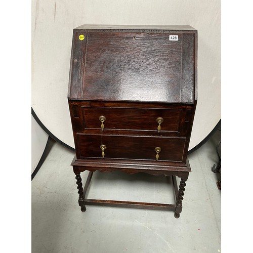 428 - VINTAGE OAK BUREAU WITH FITTED INTERIOR 2 DRAWERS BELOW ON BARLEY TWIST LEGS
H38” W23” D18”