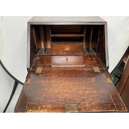 428 - VINTAGE OAK BUREAU WITH FITTED INTERIOR 2 DRAWERS BELOW ON BARLEY TWIST LEGS
H38” W23” D18”