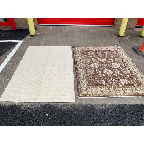 438 - 2 MODERN RUGS
Brown 74” x 57” and cream 76” x 47”