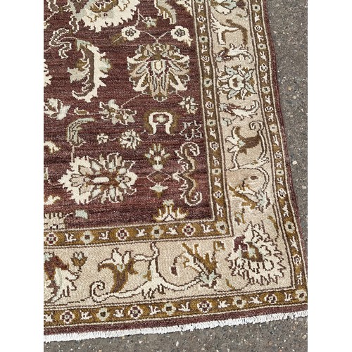 438 - 2 MODERN RUGS
Brown 74” x 57” and cream 76” x 47”