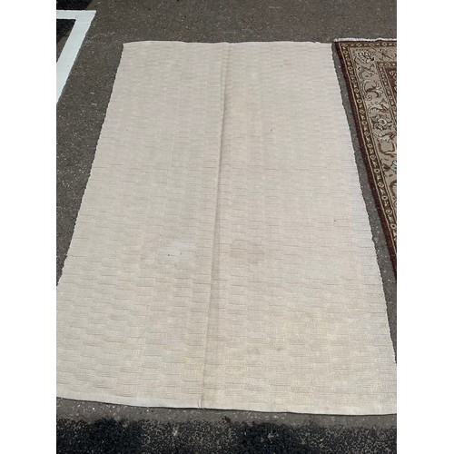 438 - 2 MODERN RUGS
Brown 74” x 57” and cream 76” x 47”