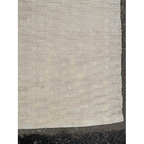 438 - 2 MODERN RUGS
Brown 74” x 57” and cream 76” x 47”