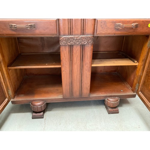 441 - VINTAGE OAK SIDEBOARD WITH 2 DRAWERS OVER 2 DOORS 
H37” W47” D20”