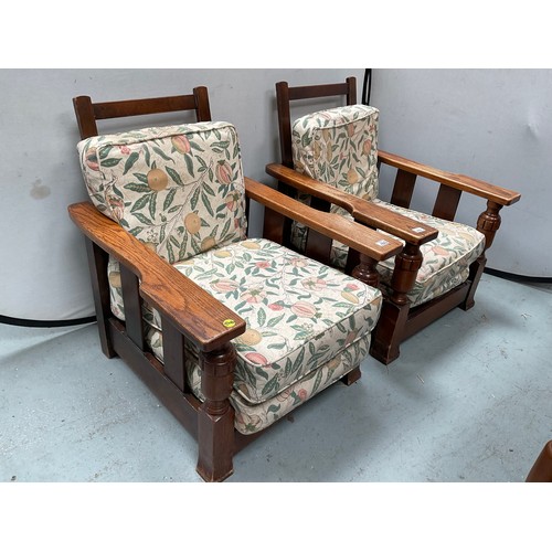 462 - PAIR OF VINTAGE OAK RECLINING CHAIRS WITH BALBOUS DECORATION AND UPHOLSTERED CUSHIONS