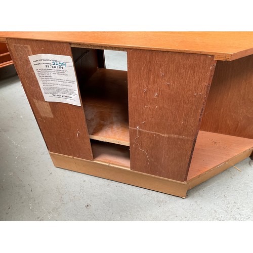 464 - BADGED NATHAN TEAK CORNER TV STAND WITH CENTRAL GLASS DOOR FLANKED BY 2 DOORS  H20” W41” D20”