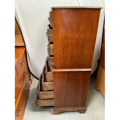 473 - REPRODUCTION WALNUT VENEERED SERPENTINE FRONTED CHEST ON CHEST WITH 8 DRAWERS H54” W36” D18”