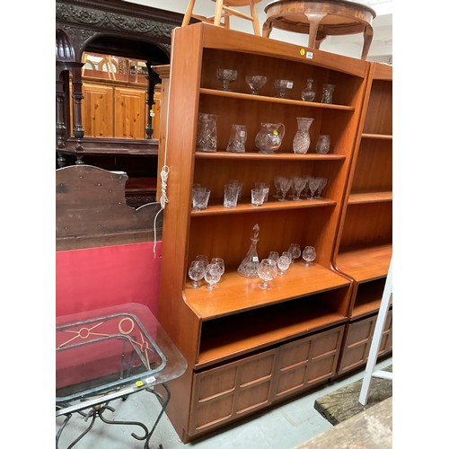 486 - BADGED NATHAN TEAK LOUNGE UNIT WITH OPEN SHELVES TO TOP OVER 2 DOORS H76” W40” D18” (glassware not i... 