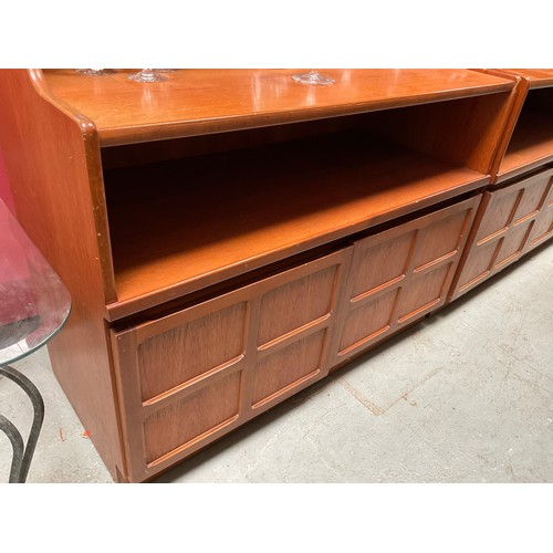 486 - BADGED NATHAN TEAK LOUNGE UNIT WITH OPEN SHELVES TO TOP OVER 2 DOORS H76” W40” D18” (glassware not i... 