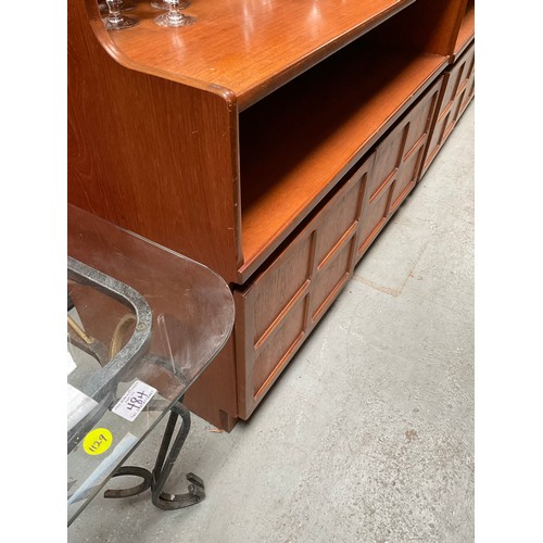 486 - BADGED NATHAN TEAK LOUNGE UNIT WITH OPEN SHELVES TO TOP OVER 2 DOORS H76” W40” D18” (glassware not i... 