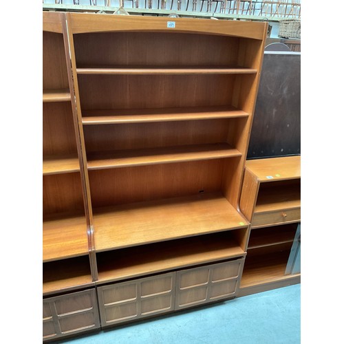 489 - BADGED NATHAN TEAK LOUNGE UNIT WITH OPEN SHELVES TO TOP OVER 2 DOORS H72” W40” D18”