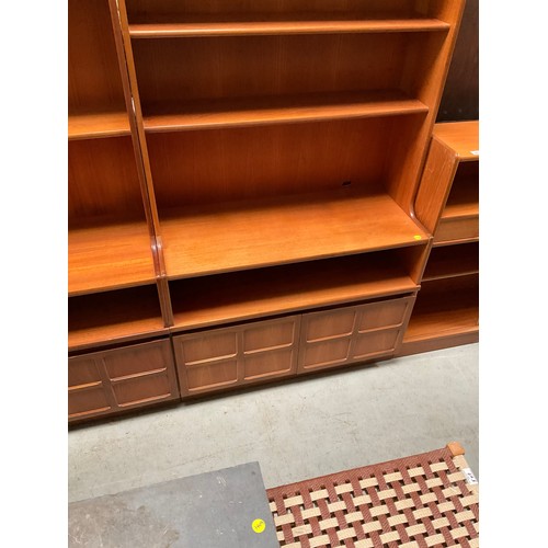 489 - BADGED NATHAN TEAK LOUNGE UNIT WITH OPEN SHELVES TO TOP OVER 2 DOORS H72” W40” D18”