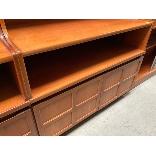 489 - BADGED NATHAN TEAK LOUNGE UNIT WITH OPEN SHELVES TO TOP OVER 2 DOORS H72” W40” D18”