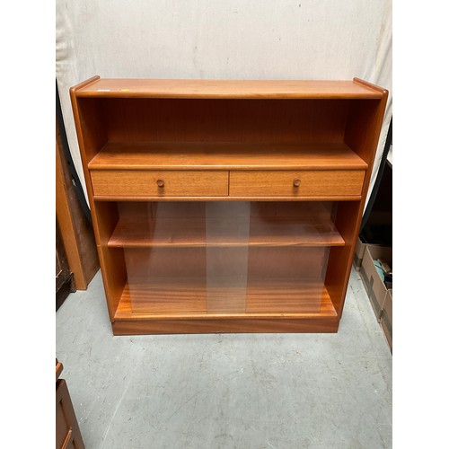 490 - BADGED NATHAN TEAK BOOKCASE WITH 2 DRAWERS OVER GLASS SLIDING DOORS H42” W40” D12”