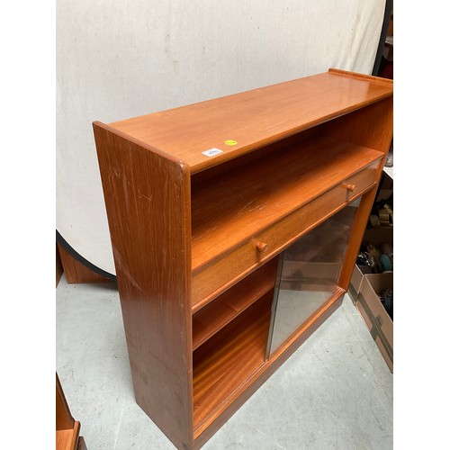 490 - BADGED NATHAN TEAK BOOKCASE WITH 2 DRAWERS OVER GLASS SLIDING DOORS H42” W40” D12”