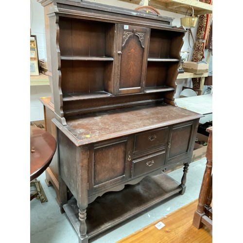 501 - VINTAGE DARK OAK DRESSER WITH CENTRAL DOOR FLANKED BY OPEN SHELVES TO TOP , BASE WITH 2 CENTRAL DRAW... 