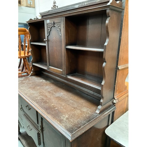 501 - VINTAGE DARK OAK DRESSER WITH CENTRAL DOOR FLANKED BY OPEN SHELVES TO TOP , BASE WITH 2 CENTRAL DRAW... 