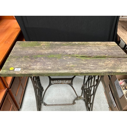 512 - GARDEN TABLE WITH SINGER CAST IRON BASE H30” W39” D18”