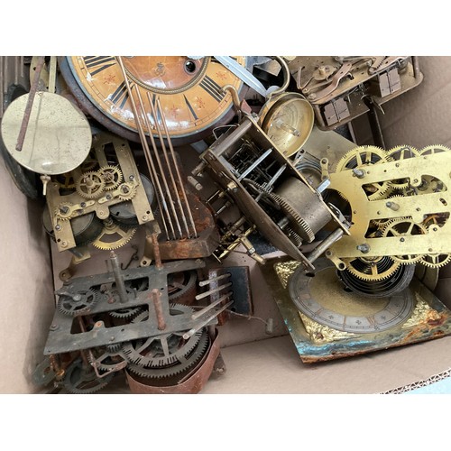 527 - 2 BOXES OF CLOCK WORKS AND PARTS