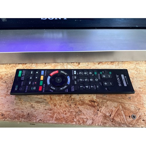 13 - 40” SONY FLAT SCREEN SMART TV WITH REMOTE