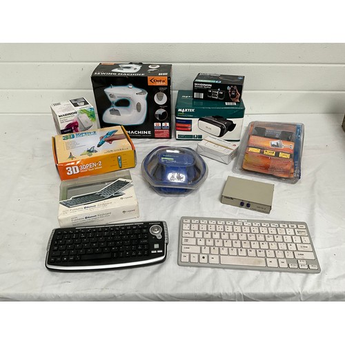 25 - A BOX OF ELECTRICAL ITEMS, TO INCLUDE SEWING MACHINE,KEYBOARDS,BLUETOOTH RECEIVER, DUAL BAND WIFI RE... 