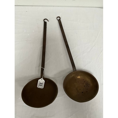 33 - TWO VINTAGE BRASS AND IRON SCOOPS