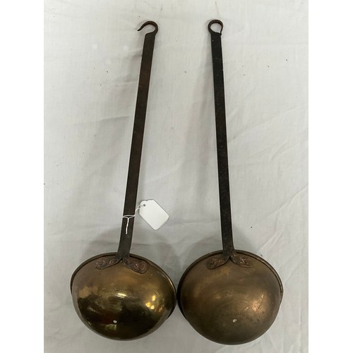 33 - TWO VINTAGE BRASS AND IRON SCOOPS