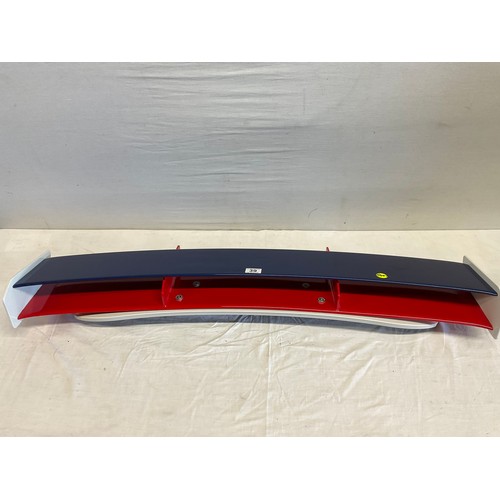 8 - A RED,WHITE AND BLUE REAR SPOILER FROM A MODERN MINI COOPER.