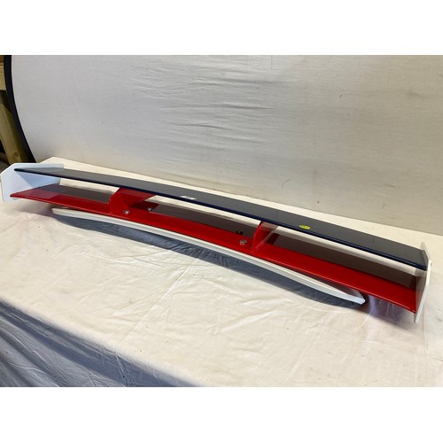 8 - A RED,WHITE AND BLUE REAR SPOILER FROM A MODERN MINI COOPER.