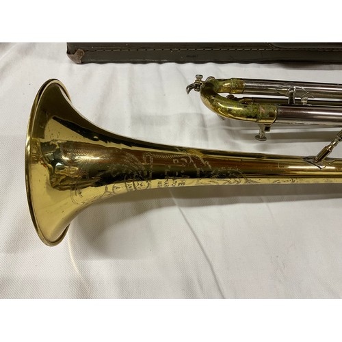 45 - BRASS AMERICAN ENGRAVED TRUMPET IN CASE WITH TWO MOUTHPIECES