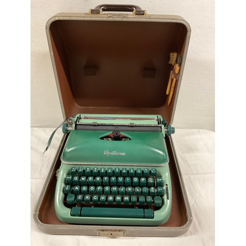 48 - VINTAGE CASED OPTIMA TYPEWRITER