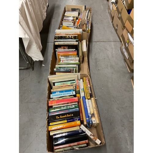 56 - THREE BOXES OF BOOKS TO INCLUDE PAPERBACKS , DVDS ETC