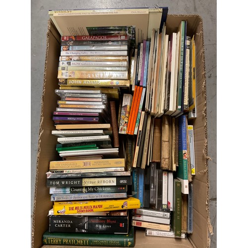 56 - THREE BOXES OF BOOKS TO INCLUDE PAPERBACKS , DVDS ETC