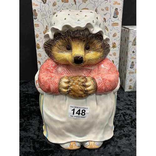 148 - QUANTITY OF BEATRIX POTTER TO INCLUDE MRS TIGGYWINKLE COOKIE JAR, PETER RABBIT JAR ETC WITH PRESENTA... 