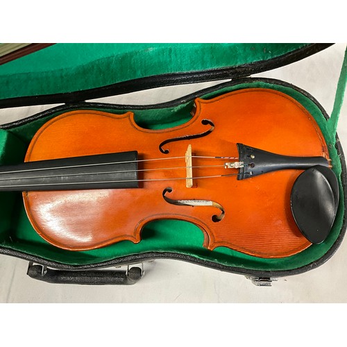 150 - TWO CASED VIOLINS AND SPARE BOW