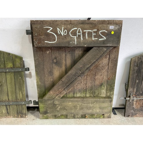 359 - THREE VINTAGE OIL SOAKED WOODEN GATES WITH IRON FURNITURE , ONE IS 37' X 48' TWO ARE 37' X 36'