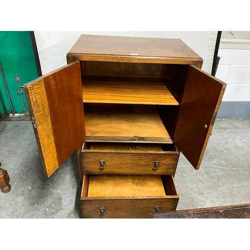 490 - VINTAGE OAK TWO DOOR OVER TWO DRAWERS TALLBOY WITH CARVED PANEL FRONT H42