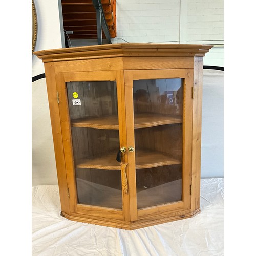 500 - REPRODUCTION PINE TWO DOOR CORNER CUPBOARD WITH SHAPED SHELF INTERIOR