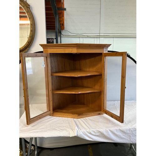 500 - REPRODUCTION PINE TWO DOOR CORNER CUPBOARD WITH SHAPED SHELF INTERIOR