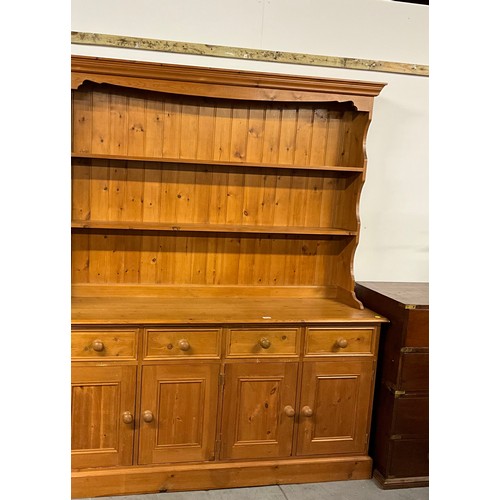 503 - MODERN PINE GALLERY TOPPED DRESSER WITH FOUR DRAWERS TO BASE AND FOUR DOORS H79