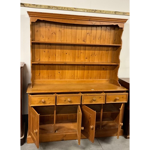 503 - MODERN PINE GALLERY TOPPED DRESSER WITH FOUR DRAWERS TO BASE AND FOUR DOORS H79