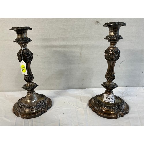 523 - PAIR OF ORNATE SILVER PLATED WEIGHTED CANDLESTICKS  H12