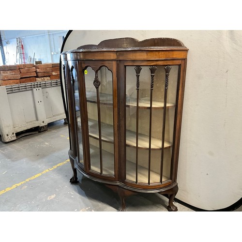 524 - OAK GLASS DOOR DISPLAY CABINET ON BALL AND CLAW FEET WITH SHAPED SHELVES TO INTERIOR H51