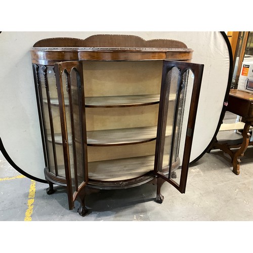 524 - OAK GLASS DOOR DISPLAY CABINET ON BALL AND CLAW FEET WITH SHAPED SHELVES TO INTERIOR H51