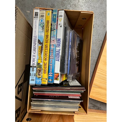 23 - BOX OF DVDS AND CDS