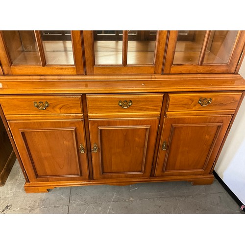 422 - LARGE MODERN TEAK DRESSER WITH GLAZED TOP OVER 3 DRAWERS AND 3 DOORS H 74’ W 54’ D 18’