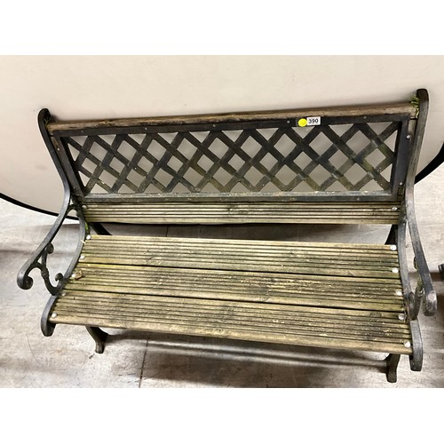 390 - VINATGE CAST IRON FRAMED GARDEN SEAT WITH WOODEN SLATS W48