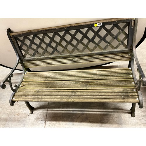 390 - VINATGE CAST IRON FRAMED GARDEN SEAT WITH WOODEN SLATS W48
